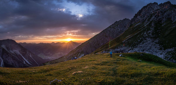 Scenic view of mountains against sky during sunset