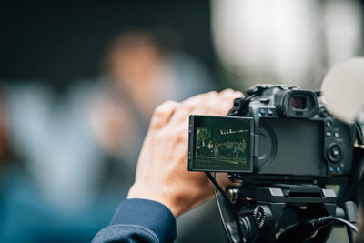 Camera at a panel discussion conference