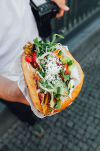 Close-up of hand holding food