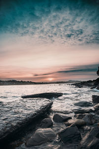 Scenic view of sea against sky during sunset