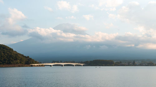 Scenic view of bridge over sea against sky