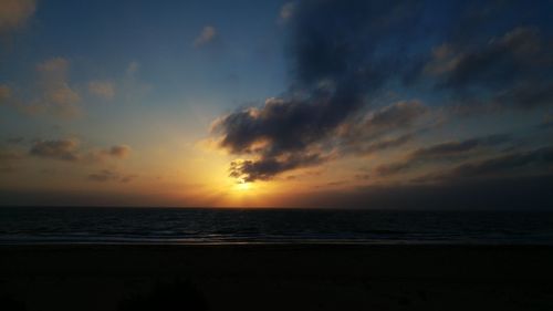 Scenic view of sunset over sea