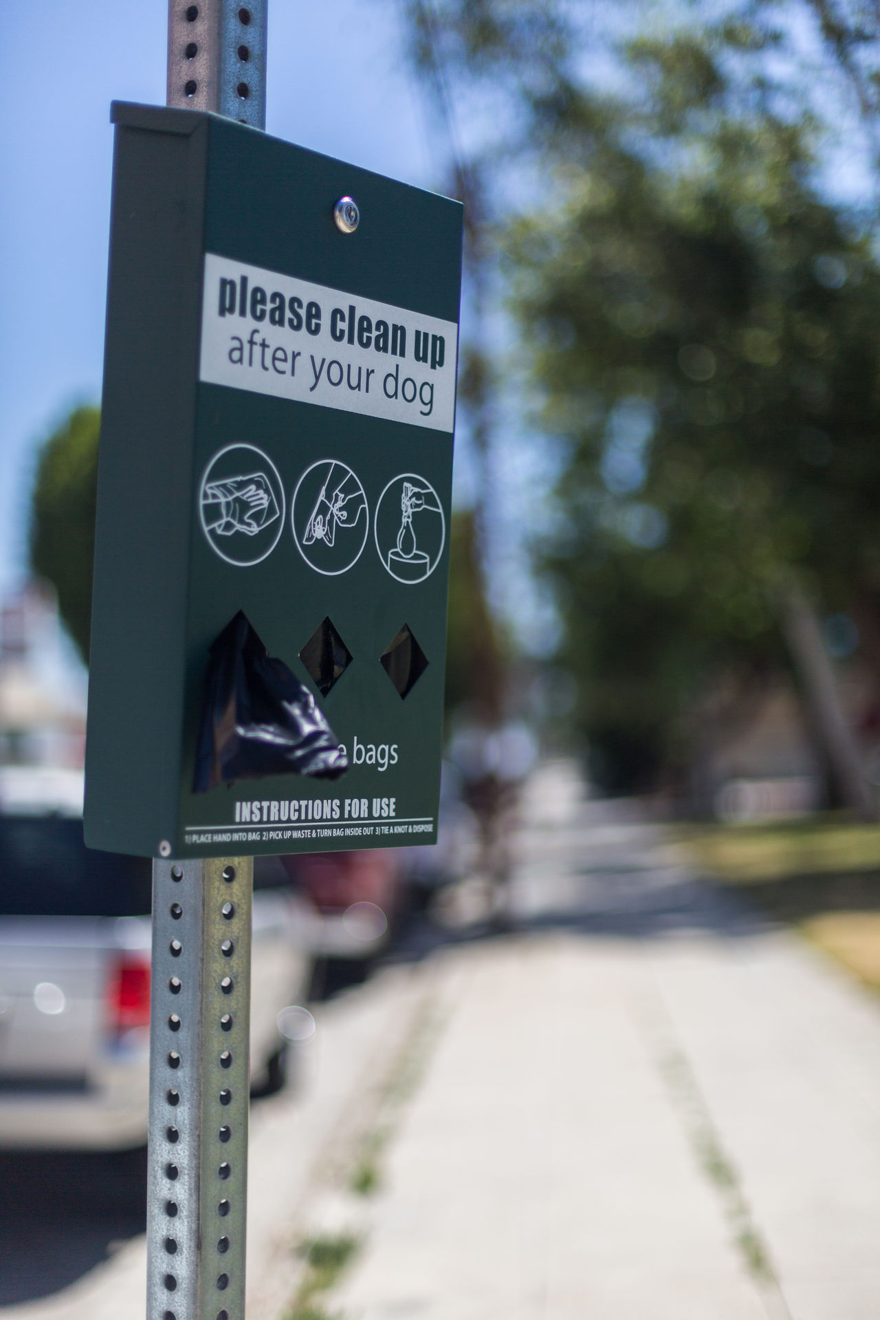 Dog poop bag dispenser