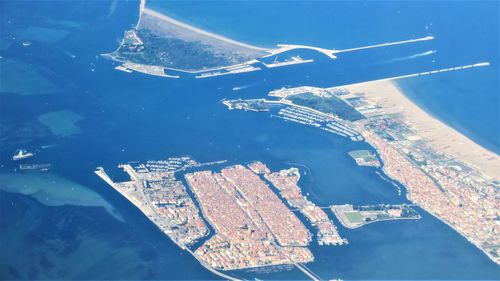 Aerial view of cityscape and sea