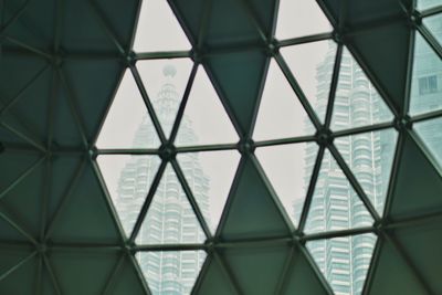 Low angle view of skylight in building