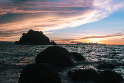 Scenic view of sea against sky during sunset