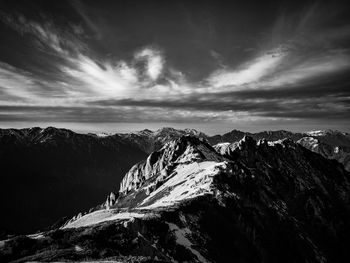 Scenic view of snowcapped mountains against sky