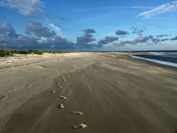 Scenic view of beach against sky