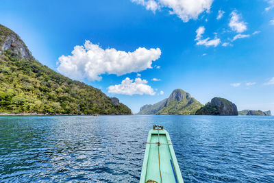 Scenic view of lake against blue sky