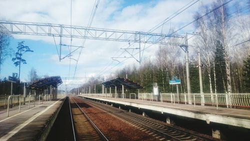 Railroad track against sky