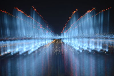 Panoramic view of illuminated fountain at night