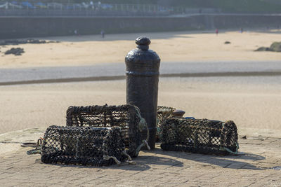 Rear view of an abandoned car on beach