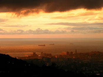 View of cityscape at sunset