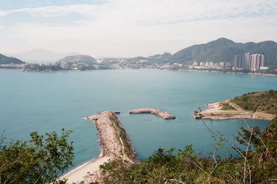 High angle view of bay and sea against sky