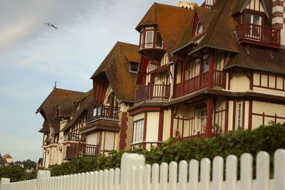 Low angle view of residential buildings against sky