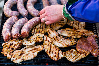 Close-up of meat on barbecue grill