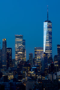 Illuminated buildings in city at night