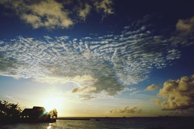 Scenic view of sea at sunset