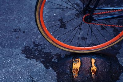 High angle view of bicycle on wet street