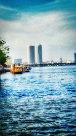 View of river with buildings in background