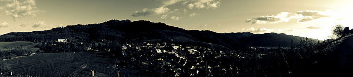 Panoramic view of mountains against sky during sunset