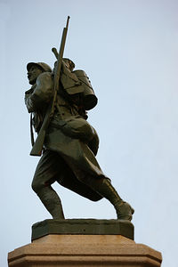 Low angle view of statue against sky