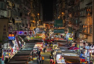 High angle view of illuminated buildings at night