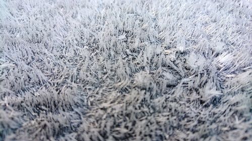 Full frame shot of snowflakes on water