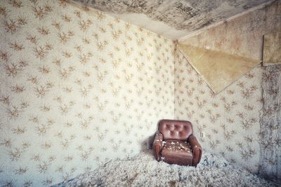 Directly above shot of child on sofa at home