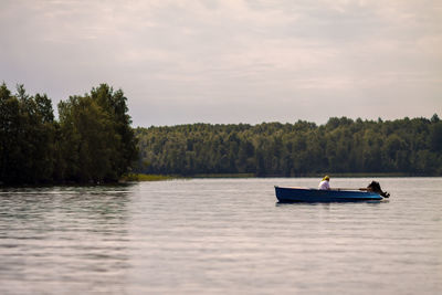 Woman swimming in the boat