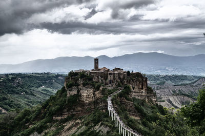 Civita di bagnoregio against cloudy sky