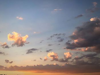 Low angle view of cloudy sky during sunset