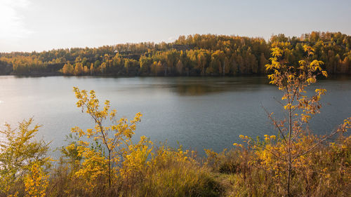 Scenic view of lake against sky during autumn