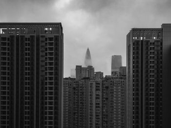 Low angle view of modern buildings against sky