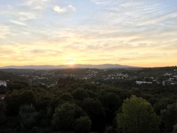 High angle view of townscape against sky at sunset