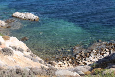 High angle view of rocks on beach