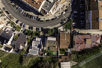 High angle view of street amidst buildings in city