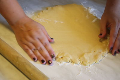 Midsection of woman preparing food