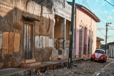 Houses against buildings in city