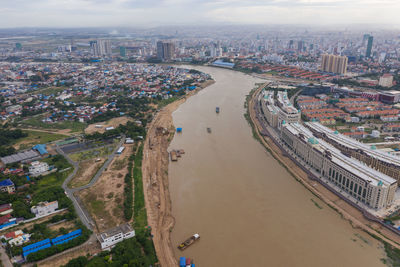 High angle view of buildings against sky in city