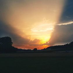 Scenic view of landscape at sunset