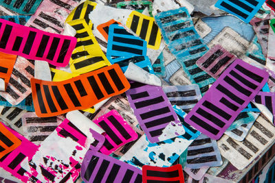 High angle view of multi colored umbrellas on paper