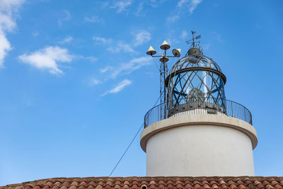 Low angle view of water tower against sky