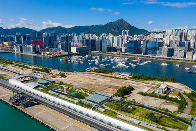 High angle view of buildings in city against sky