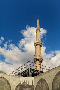 Low angle view of minaret against sky