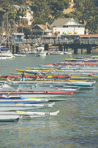 Boats moored at harbor