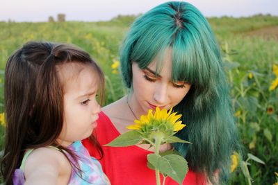 Portrait of women with flowers and plants