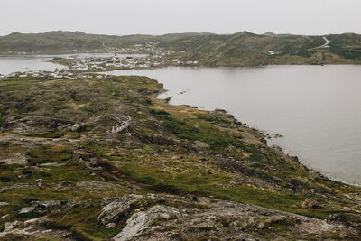 Scenic view of river and mountains