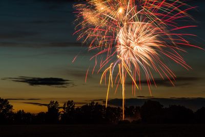 Low angle view of sky illumed with fire crackers