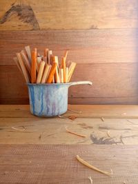 Wooden table in container